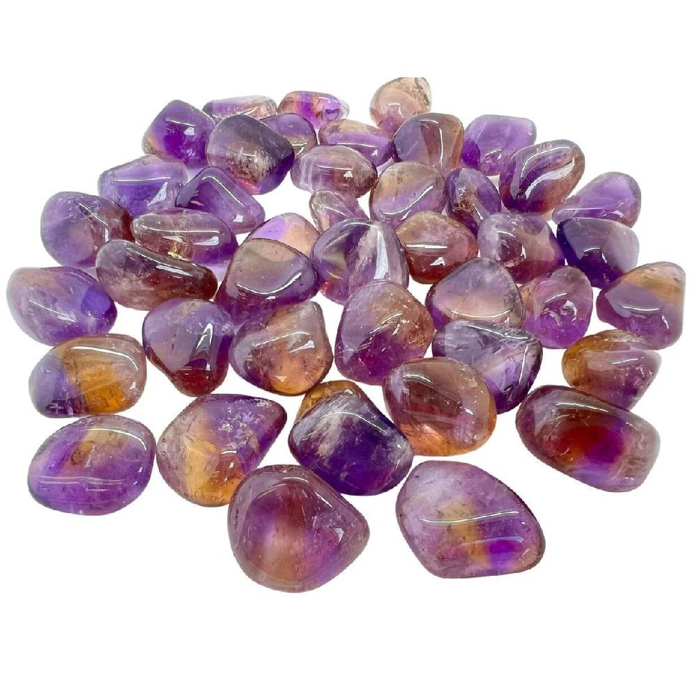 Pulēti ametrīna kristāli ar dabisku violetā ametista un dzeltenā citrīna krāsu pāreju uz balta fona – MarreDeco izejmateriāli nodoma svecēm iekšējam mieram